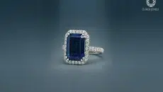 Ouros Jewels emerald-cut blue sapphire halo ring with lab grown diamond accents