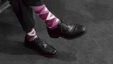 Argyle style socks with black shoes and trousers