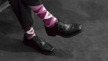 Argyle style socks with black shoes and trousers